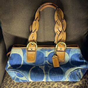 Coach, denim, braided leather handles, 12” long, 8” deep, clean inside.
